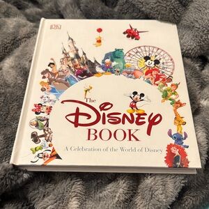 Disney Book with Colorful Characters and Iconic Imagery and a Disney Fanny pack